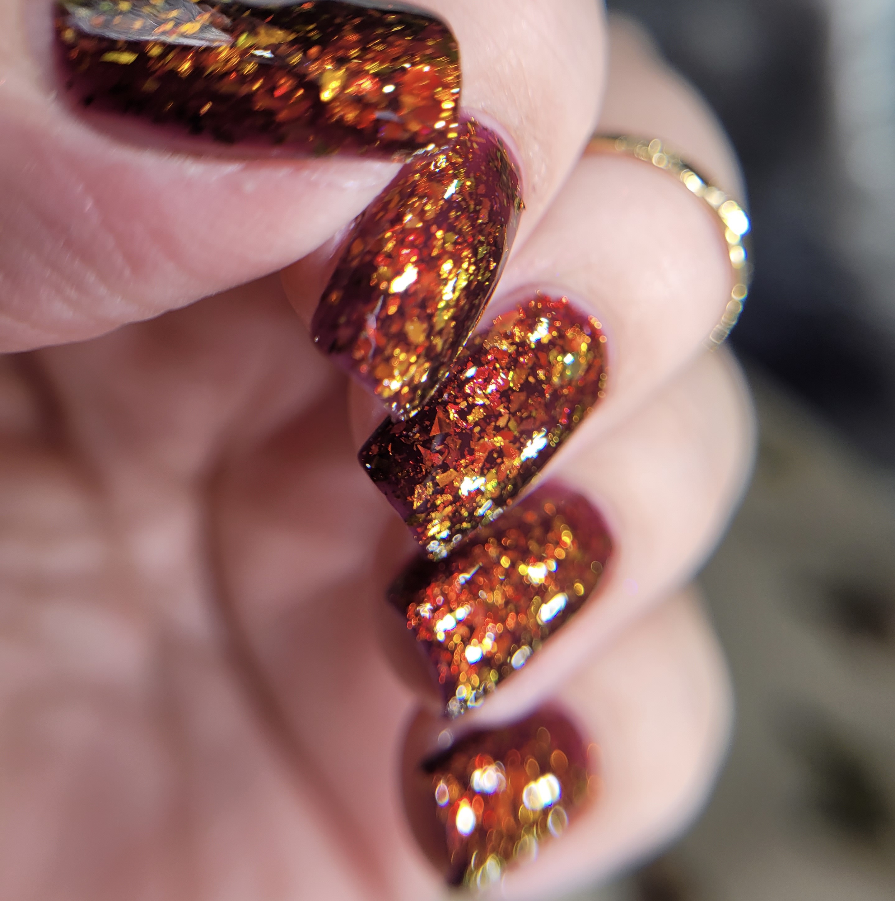 Burnt orange and gold glitter nails